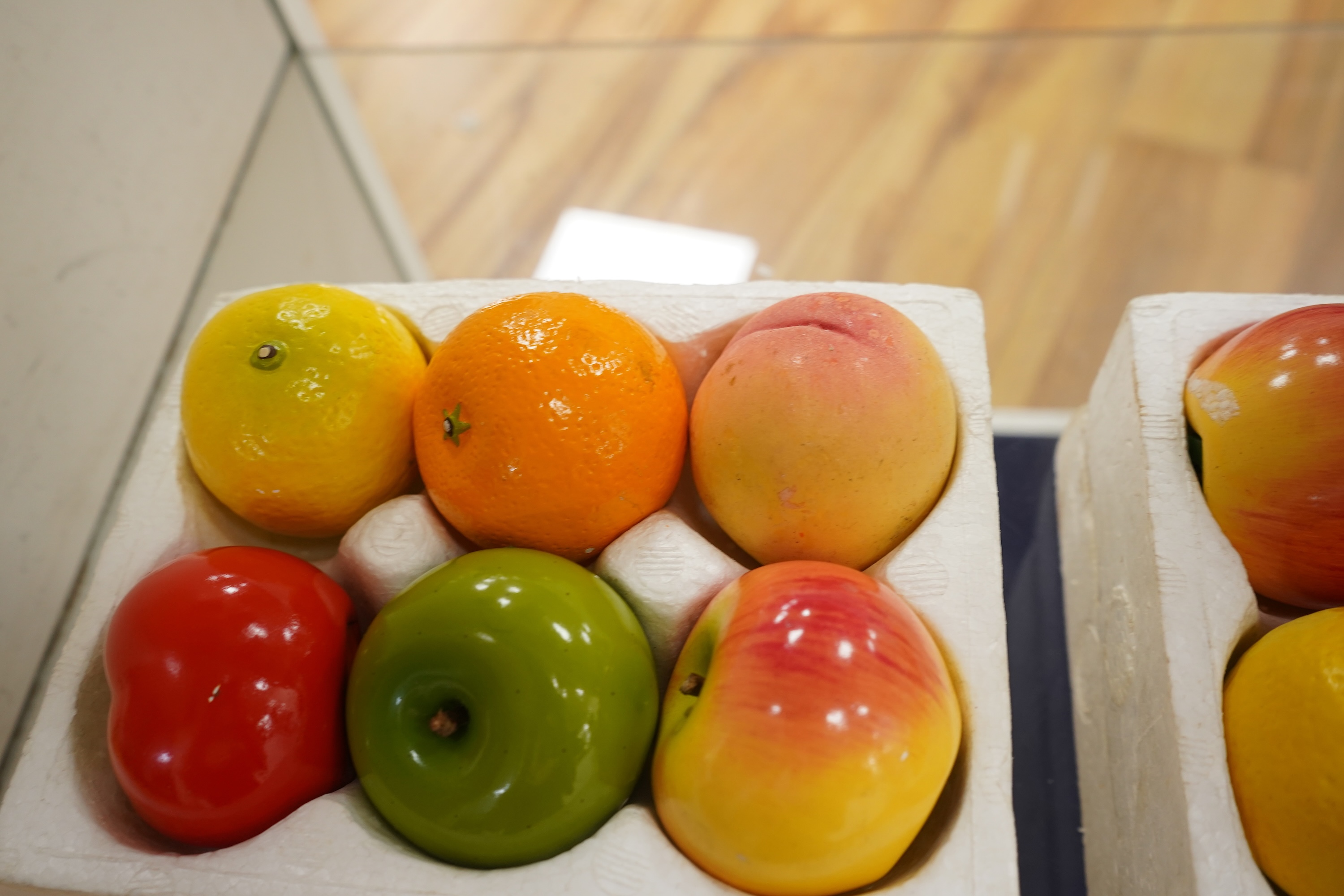 Two boxed sets of novelty Chinese Penguin Brand pencil sharpeners in the form of fruit